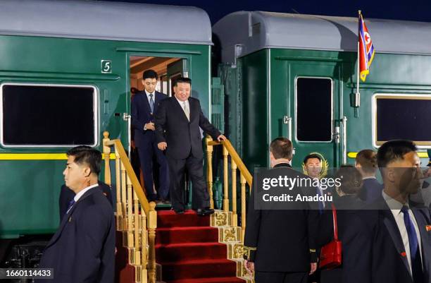 North Korea's leader Kim Jong Un walks out of his train after arriving at the North Korea-Russia border in Khasan, some 125 km south of Vladivostok,...