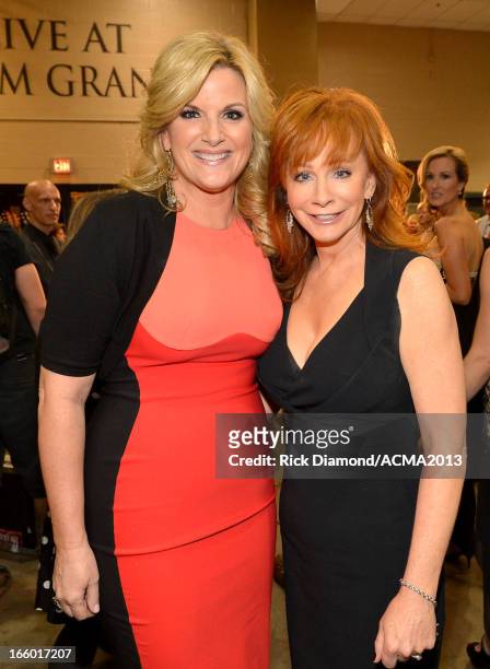 Singers Trisha Yearwood and Reba McEntire attend the 48th Annual Academy of Country Music Awards at the MGM Grand Garden Arena on April 7, 2013 in...