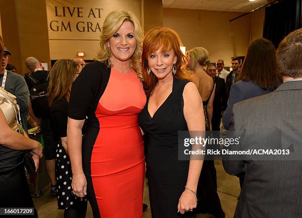 Singers Trisha Yearwood and Reba McEntire attend the 48th Annual Academy of Country Music Awards at the MGM Grand Garden Arena on April 7, 2013 in...