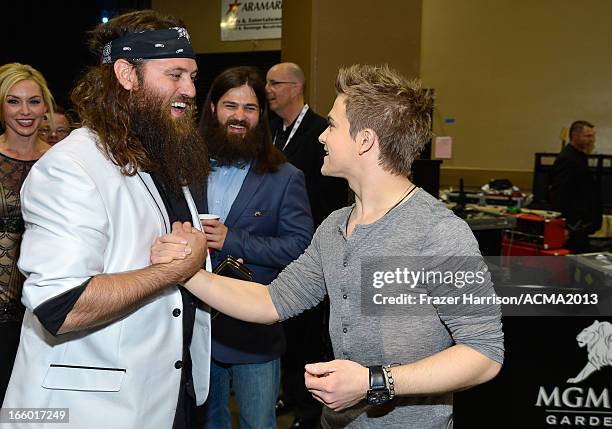 Personalities Willie Robertson and Jep Robertson and musician Hunter Hayes attends the 48th Annual Academy of Country Music Awards at the MGM Grand...