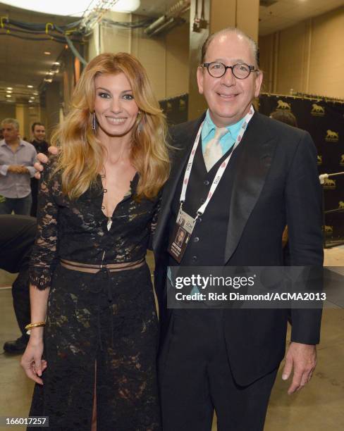 Singer Faith Hill and President of Warner Music Nashville John Esposito attend the 48th Annual Academy of Country Music Awards at the MGM Grand...