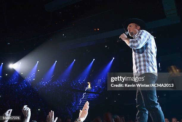 Musician Garth Brooks performs onstage during the 48th Annual Academy of Country Music Awards at the MGM Grand Garden Arena on April 7, 2013 in Las...