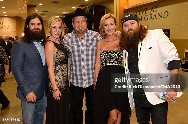 Personalities Jep Robertson and Jessica Robertson Korie Robertson and Willie Robertson of Duck Dynasty and musician Garth Brooks attend the 48th...