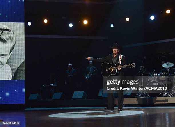 Musician George Strait performs onstage during the 48th Annual Academy of Country Music Awards at the MGM Grand Garden Arena on April 7, 2013 in Las...