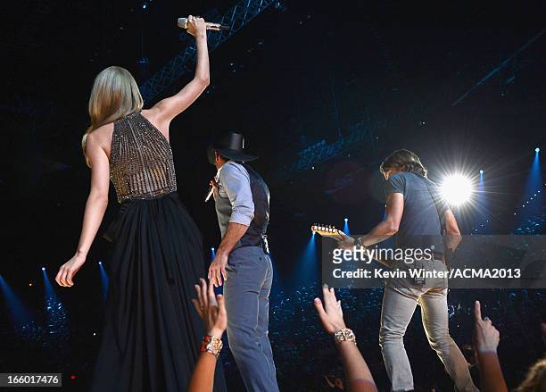Musicians Taylor Swift, Tim McGraw, and Keith Urban perform onstage during the 48th Annual Academy of Country Music Awards at the MGM Grand Garden...