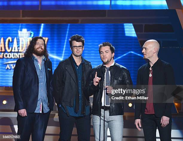 Recording artists James Young, Chris Thompson, Mike Eli and Jon Jones of the Eli Young Band speak onstage during the 48th Annual Academy of Country...