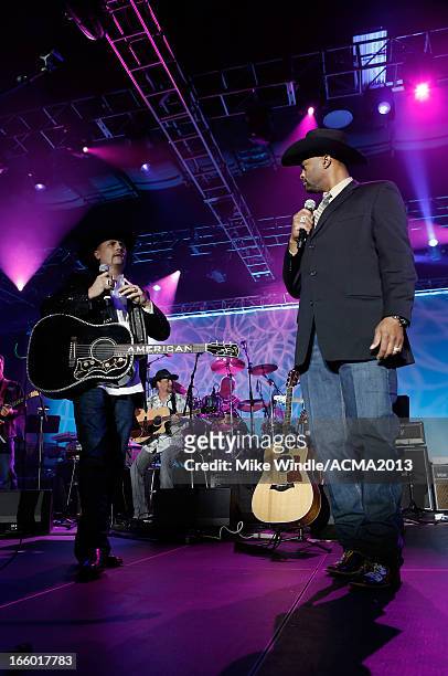 Musicians John Rich of music group Big & Rich and Cowboy Troy perform onstage at the All Star Jam during the 48th Annual Academy Of Country Music...