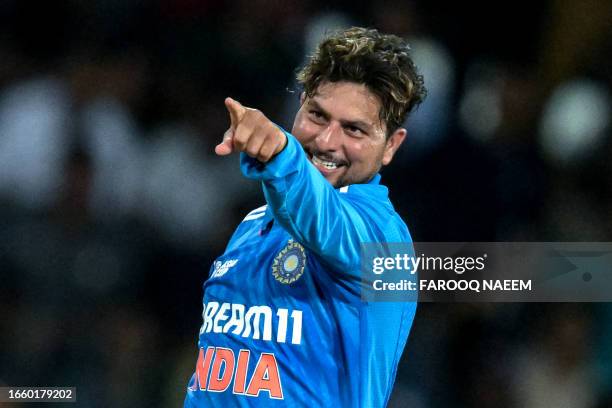 India's Kuldeep Yadav celebrates after taking the wicket of Sri Lanka's Sadeera Samarawickrama during the Asia Cup 2023 Super Four one-day...