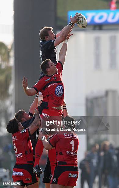 Tom Croft of Leicester beats Bakkies Botha to the lineout ball during the Heineken Cup quarter final match between Toulon and Leicester Tigers at...