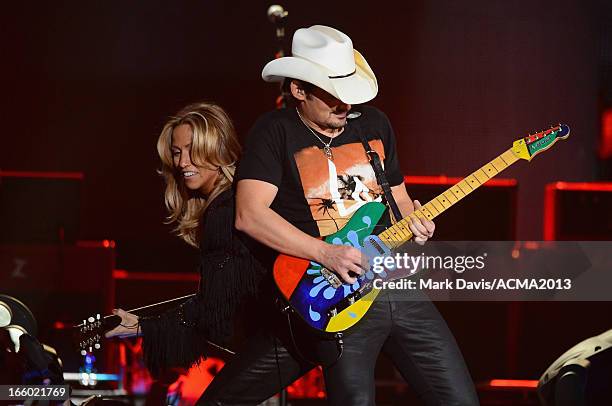 Musicians Sheryl Crow and Brad Paisley perform onstage during the 48th Annual Academy Of Country Music Awards - ACM Fan Jam After Party at Orleans...