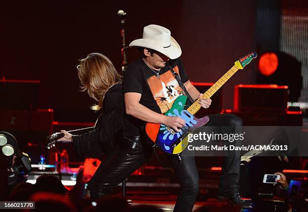 Musicians Sheryl Crow and Brad Paisley perform onstage during the 48th Annual Academy Of Country Music Awards - ACM Fan Jam After Party at Orleans...