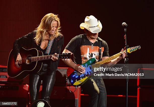 Musicians Sheryl Crow and Brad Paisley perform onstage during the 48th Annual Academy Of Country Music Awards - ACM Fan Jam After Party at Orleans...