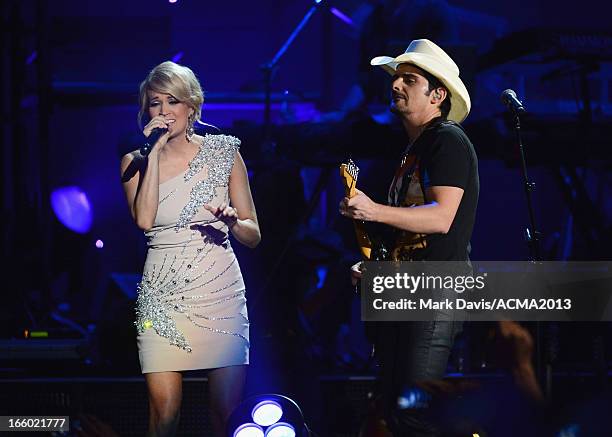 Musicians Carrie Underwood and Brad Paisley perform onstage during the 48th Annual Academy Of Country Music Awards - ACM Fan Jam After Party at...