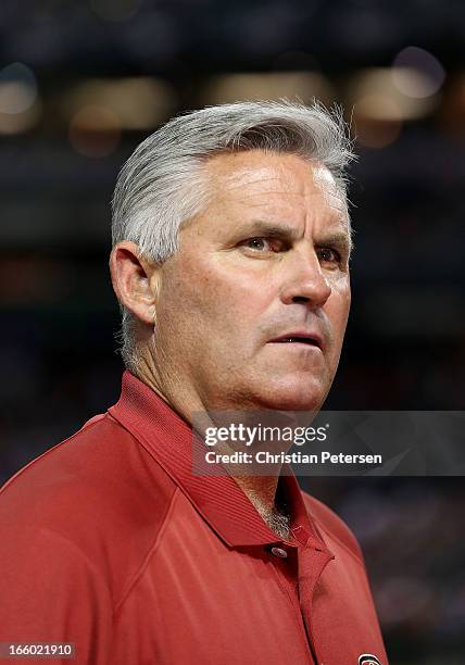 General manager Kevin Towers of the Arizona Diamondbacks stands on the field before the MLB Opening Day game against the St. Louis Cardinals at Chase...