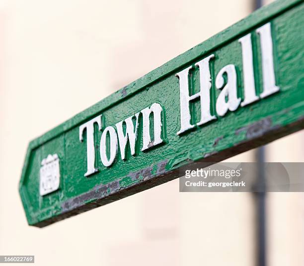 town hall arrow sign - local government building stockfoto's en -beelden