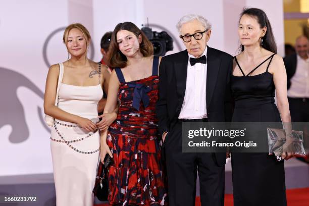 Bechet Allen, Manzie Tio Allen, Woody Allen and Soon-Yi Previn attend a red carpet for the movie "Coup De Chance" at the 80th Venice International...