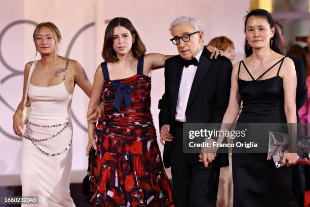 Bechet Allen, Manzie Tio Allen, Woody Allen and Soon-Yi Previn attend a red carpet for the movie "Coup De Chance" at the 80th Venice International...