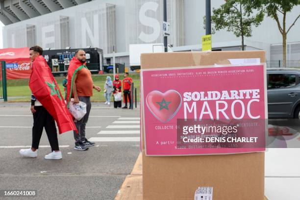 This photograph taken on September 12, 2023 shows a collection point for the victims of the earthquake in Morocco outside at the Stade...