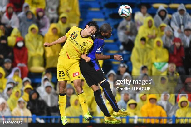 Patric of Gamba Osaka and Hirofumi Watanabe of Kashiwa Reysol compete for the ball during the J.League J1 match between Kashiwa Reysol and Gamba...