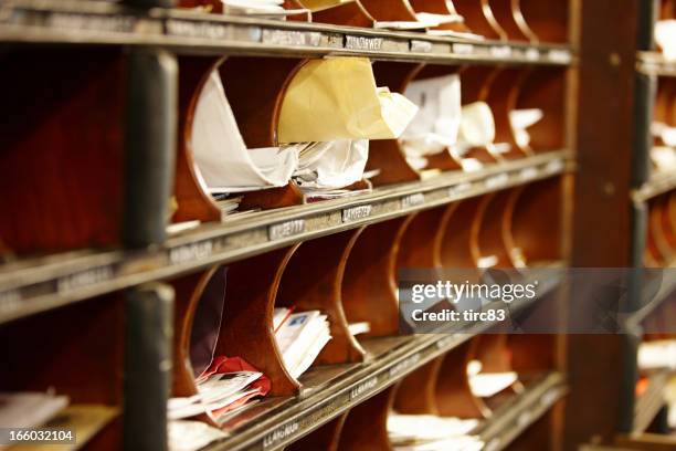 old fashioned sorting office on train - pigeonholes stock pictures, royalty-free photos & images
