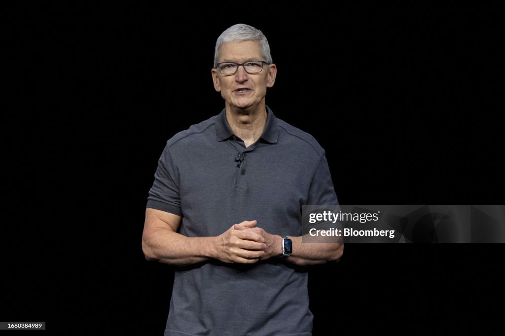 Team Cook Tim Cook, chief executive officer of Apple Inc., during an event at ...