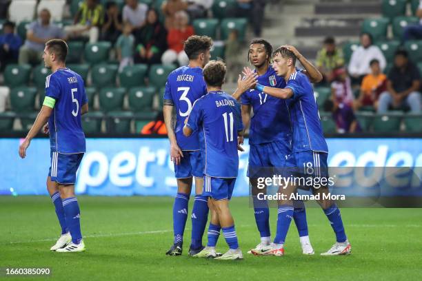 Fabio Miretti of Italy celebrates with teammates after scoring his team's first goal during UEFA European Under-21 Championship Qualifier match...