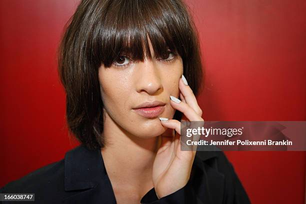 Model prepares backstage at the Christopher Esber show during Mercedes-Benz Fashion Week Australia Spring/Summer 2013/14 at 10 Carrington Rd,...