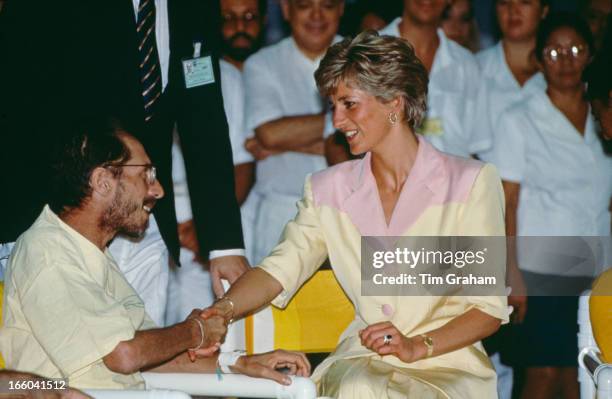 Diana, Princess of Wales visiting patients suffering from AIDS at the Hospital Universidade in Rio de Janeiro, Brazil, 25th April 1991.