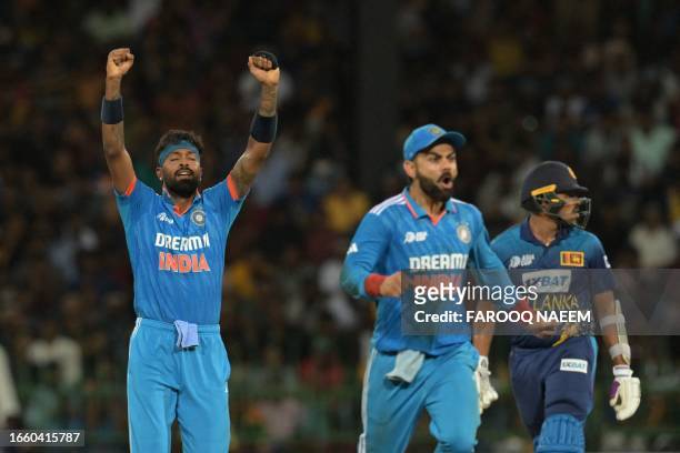 India's Hardik Pandya celebrates after taking the wicket of Sri Lanka's Maheesh Theekshana during the Asia Cup 2023 Super Four one-day international...