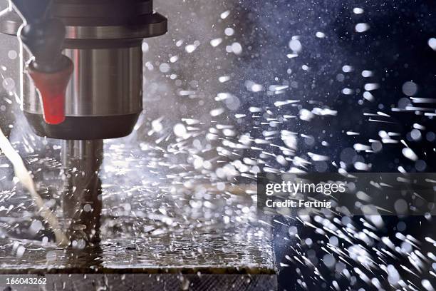 machine tool in use - milling stock pictures, royalty-free photos & images