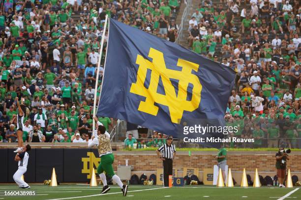 The Notre Dame Fighting Irish cheerleaders celebrate a touchdown against the Tennessee State Tigers during the first half at Notre Dame Stadium on...