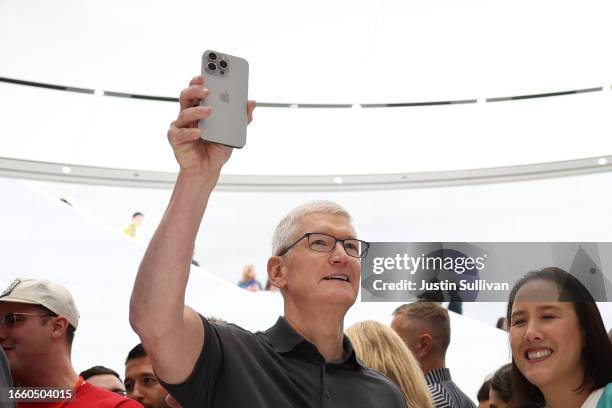 Apple CEO Tim Cook holds up a new iPhone 15 Pro during an Apple event on September 12, 2023 in Cupertino, California. Apple revealed its lineup of...