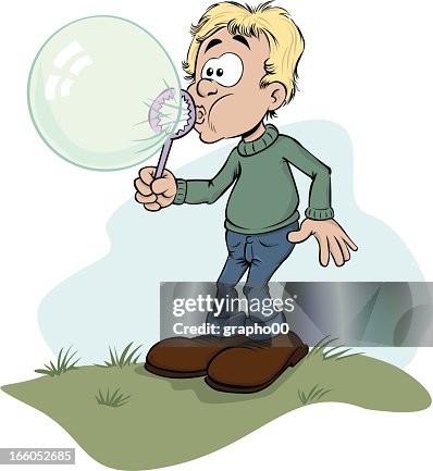 Boy makes a bubble. Boy makes a bubble.
