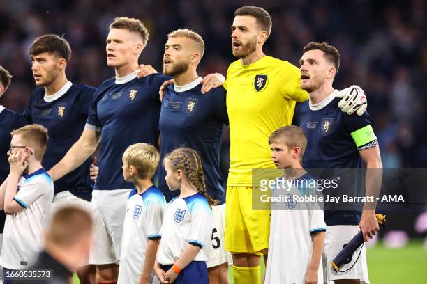 Andrew Robertson of Scotland sings the national anthem of Scotland wth his teammates during the 150th Anniversary Heritage Match between Scotland and...