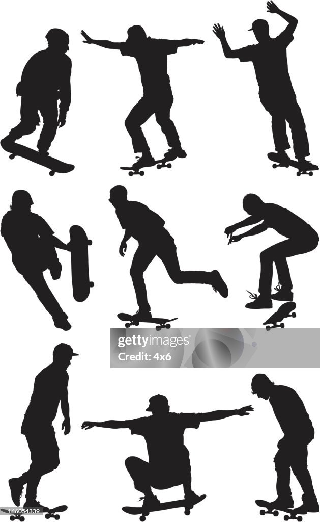 Silhouette of men skateboarding