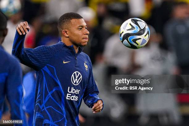 Kylian Mbappe of France kicks the ball during the International Friendly match between Germany and France at Signal Iduna Park on September 12, 2023...