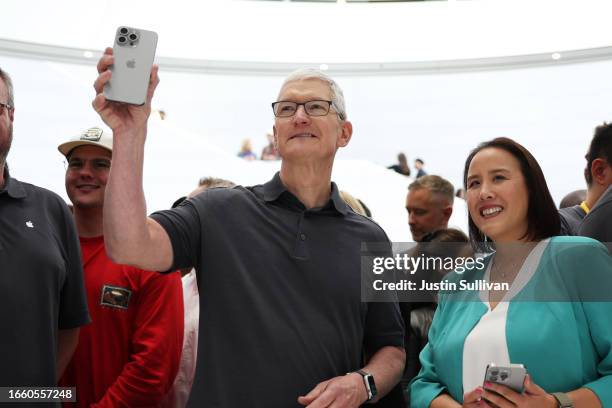 Apple CEO Tim Cook holds up a new iPhone 15 Pro during an Apple event on September 12, 2023 in Cupertino, California. Apple revealed its lineup of...