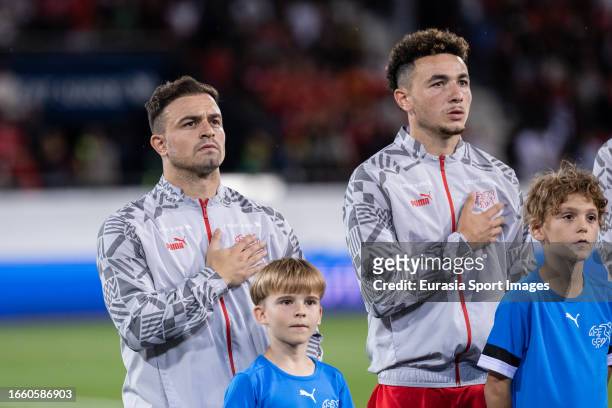 Granit Xhaka of Switzerland , Ruben Vargas of Switzerland as they line up for the National Anthems during the UEFA EURO 2024 European qualifier match...