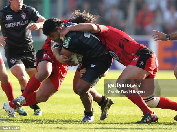 Manu Tuilagi of Leicester is tackled during the Heineken Cup quarter final match between Toulon and Leicester Tigers at Felix Mayol Stadium on April...