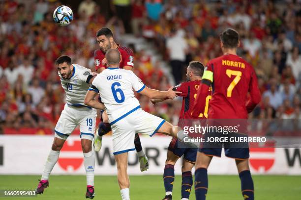 Spain's midfielder Mikel Merino scores his team's second goal during the EURO 2024 first round group A qualifying football match between Spain and...