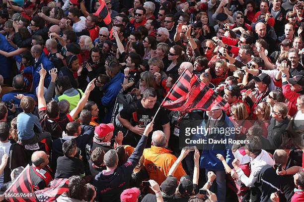 The Toulon team arrive through the packed crowds prior to the Heineken Cup quarter final match between Toulon and Leicester Tigers at Felix Mayol...