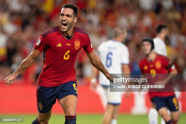 Spain's midfielder Mikel Merino celebrates scoring his team's second goal during the EURO 2024 first round group A qualifying football match between...