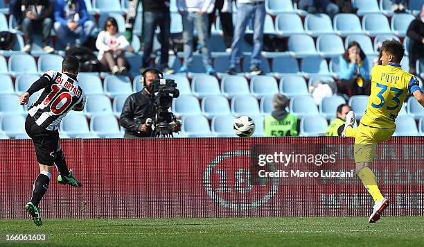 Antonio Di Natale of Udinese Calcio scores his second goal during the Serie A match between Udinese Calcio and AC Chievo Verona at Stadio Friuli on...