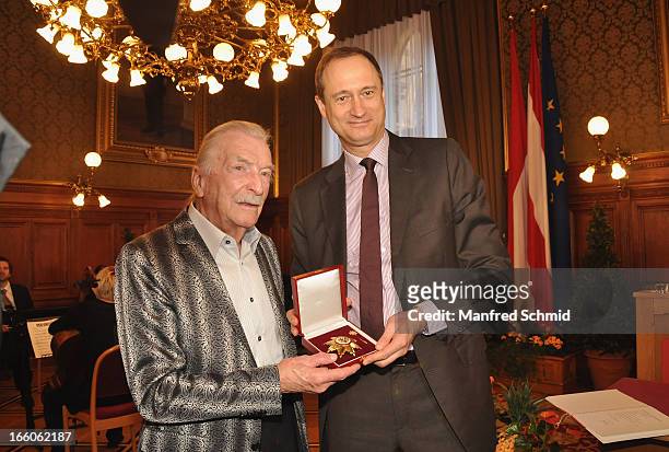 Andreas Mailath-Pokorny presents James Lastwith the 'Goldenes Ehrenzeichen fuer Verdienste um das Land Wien' given in the Rathaus Wien on April 8,...