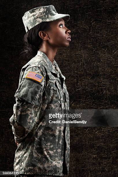 female african american soldier series: against dark brown background - african american soldier bildbanksfoton och bilder