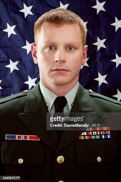 decorated american soldier with class a uniform against usa flag - army medals stock pictures, royalty-free photos & images