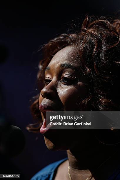 Ta'Rea Campbell sings the National Anthem before the Philadelphia Phillies Home Opener against the Kansas City Royals at Citizens Bank Park on April...