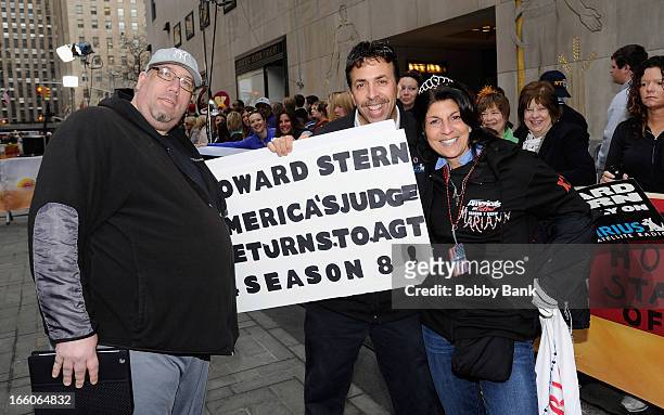 Howard Stern fans, Eric Bleaman, Bobo and Mariann from Brooklyn attends the "America's Got Talent" New York Auditions at Rockefeller Center on April...