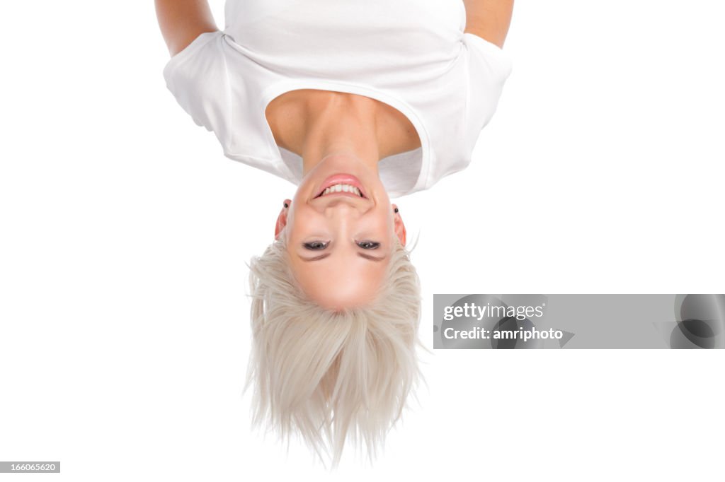 Smiling woman upside down