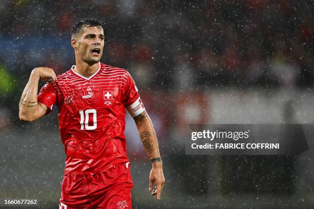 Switzerland's midfielder Granit Xhaka reacts during the UEFA Euro 2024 football tournament Group I qualifying match between Switzerland and Andorra...